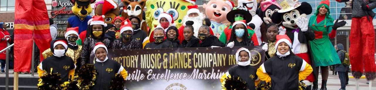 group smiling during holiday parade