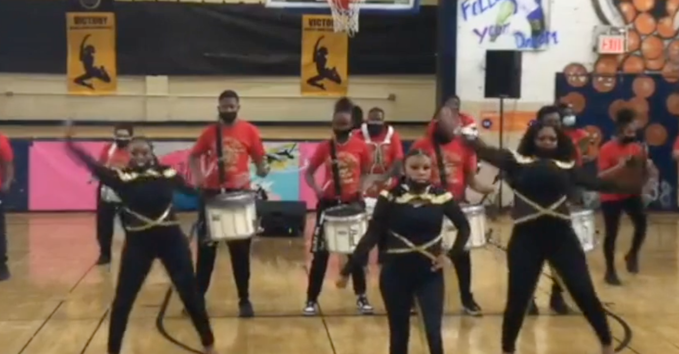 band and dancers in gymnasium