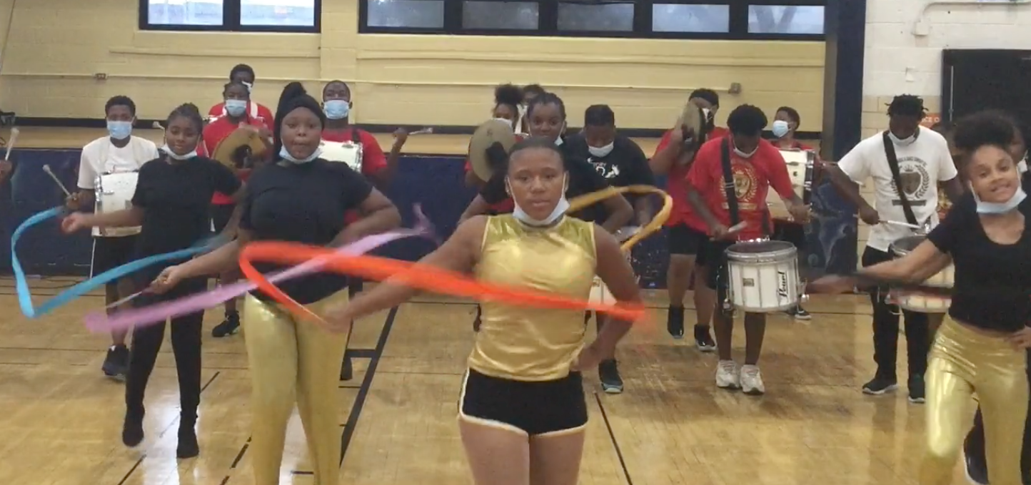 girls dancing with colorful ribbons